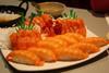 Salmon sushi and sashimi platter. Credit: Angelicadlr/License CC BY-SA 3.0