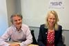 Nicolas Guichoux, chief programme officer at MSC, and Libby Woodhatch, executive chair at MarinTrust sitting at a desk during an MoU signing