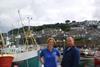 Pictured in Newlyn Harbour, Seafish chief economist, Hazel Curtis, with skipper James Chown, owner of Harvest Reaper TT177, who fishes around Cornwall using gill and tangle nets.