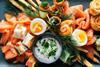 Salmon platter with mayonnaise and boiled eggs