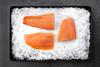3 salmon fillets on ice