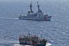 The crew of the Coast Guard Cutter Rush escorts the suspected high seas drift net fishing vessel Da Cheng in the North Pacific Ocean on 14 August 2012. Credit: U.S. Coast Guard