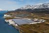 Arctic Seafarm land-based farm with mountains in the background