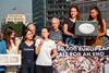 The image shows Oceana representatives taking the petition to the EU