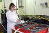 Bonnie Laverock of Plymouth Marine Laboratory checks her experiment on the European mussel's reaction to increased seawater acidity