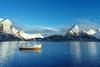 Fishing boat and Reine Village, Lofoten Islands, Norway