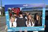 Pupils hold a selfie frame in front of a Fergusons Transport tanker