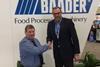 The final paperwork was signed between Chris Anderson, director of Northbay Pelagic (left) and Robert Focke, managing director of Baader (right), during the Boston Seafood Show
