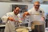 Chefs Peter Manifis and Don Hancey prepare a magnificent squid risotto for the teachers' lunch