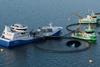 The image shows Trident Aqua Services aquaculture vessels on the water