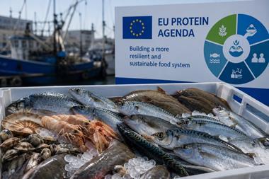 seafood on ice with a sign saying EU Protein Agenda in the background