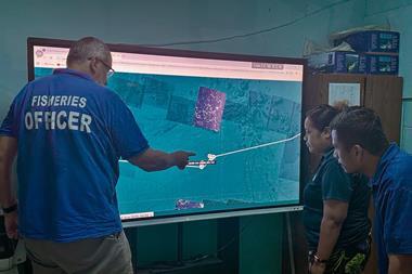 NZ MFAT-funded Fisheries Adviser assists NORMA officials in analysing the manoeuvring of an arriving vessel