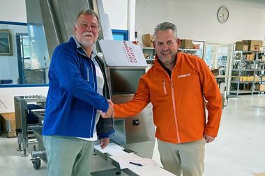 Gorm Sorensen (blue jacket) and Ingmar Baars (orange jacket)