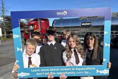 Pupils hold a selfie frame in front of a Fergusons Transport tanker