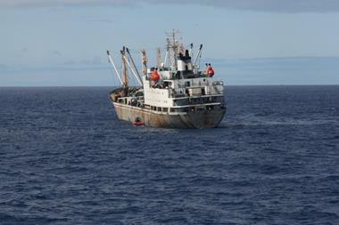 The image shows an IUI fishing vessel taken by the U.S. government