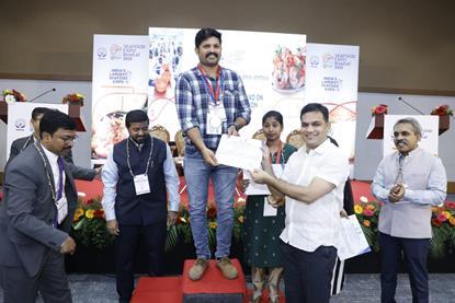 Shri Hibi Eden, MP & authority member at MPEDA, handing over the certificate to Thanseer K R of Abad Foods Malipuram, the winner of the first-ever National Skill Olympiad