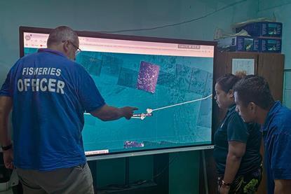 NZ MFAT-funded Fisheries Adviser assists NORMA officials in analysing the manoeuvring of an arriving vessel
