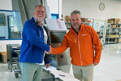Gorm Sorensen (blue jacket) and Ingmar Baars (orange jacket)