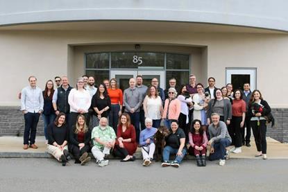 Members of the Global Seafood Alliance grouped outside a building