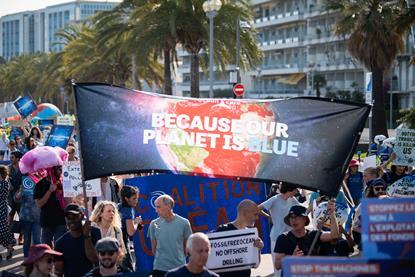 People marching to save the oceans from overfishing and climate change
