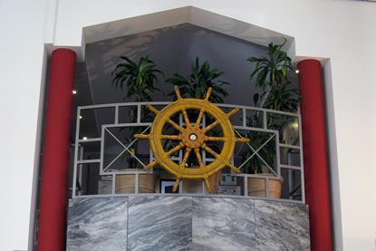 The bridge and ship's wheel dominate the entrance to Lowri Evans' maritime and fisheries headquarters in Brussels. Credit: TW : EEC Photos