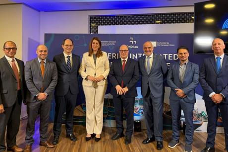 The image shows attendees at the official launch of FIIS Malta