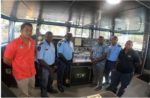 FFA DFO Allan Rahari and colleague Yohni Fepuleai join RSIPF staff to present the body camera technology. Photo: FFA