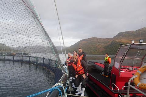 Tour guests visited a MOWI salmon farm on a loch