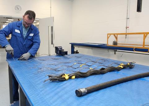 Test lab technician John Allen at work at the new facility