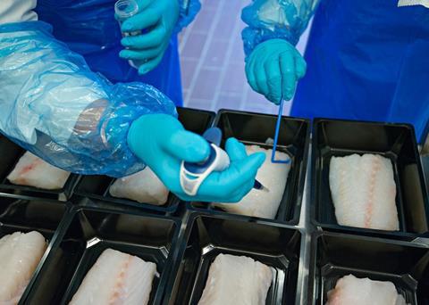 The scientists apply bacteria to the fish which is packaged and stored for analysis