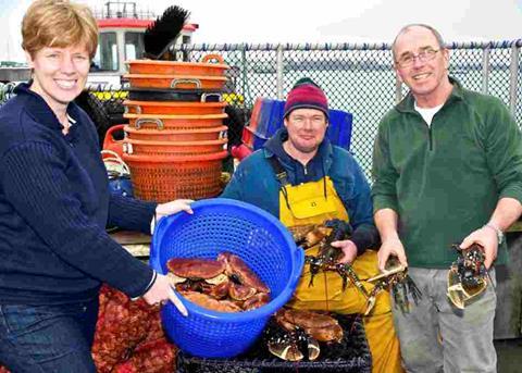 L-R: Henriette Reinders of South East Seafood with local fishermen Tony Bennett and Roger Ramsden and their catch of the day