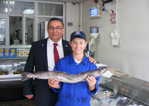 Christian Allard MSP (left) at J. Charles with  Henry Charles a fourth generation fish merchant in Torry