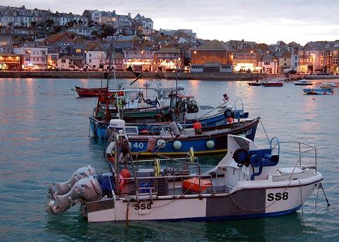 Fishing boats beside St Ives harbour. Credit: Andy F/CC BY-SA 2.0