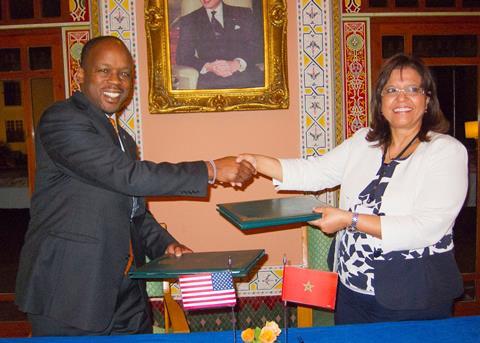 Russell Smith III of the US and Morocco's Mme Zakia Driouich sign agreement. Photo: NOAA