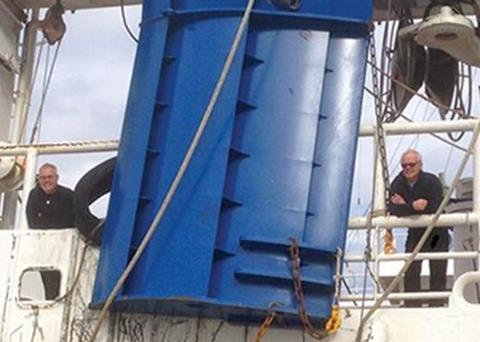 Thor and Sture Claesson flanking one of the new doors