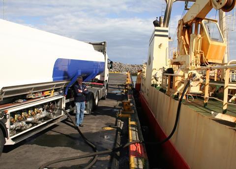 Fuelling a trawler in Iceland. The drop in fuel prices has been a huge boost to fishing companies