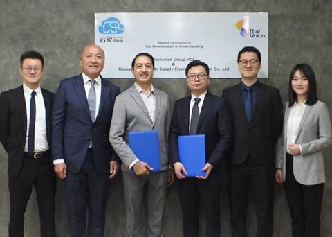 Members of Thai Union and Win-Chain celebrate the signing of an MOU to help bring Thai Union products to the Chinese market Photo: Thai Union