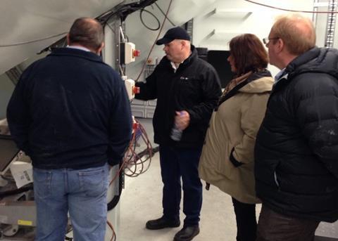 Huon Aquaculture has launched the first of its four state-of-the-art feed barges