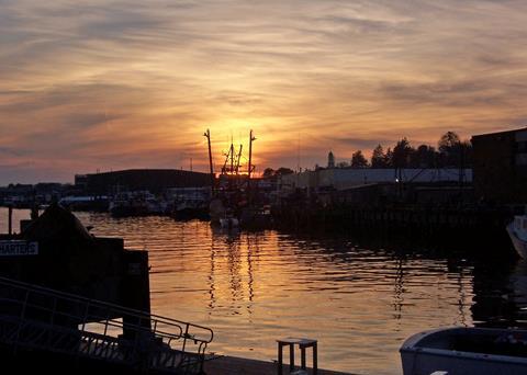 The Gloucester, Massachusetts fishing port at sunset. Credit: NOAA/Caleb Gilbert