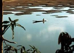 Fishing at dusk on the Mekong river, Laos. ©Michele Depraz