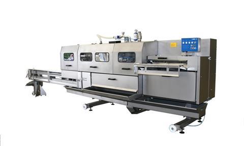 Baader’s more hygienic salmon gutting machine, the new 142.]