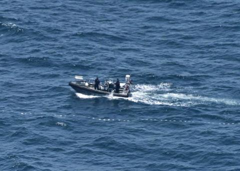 The two tonne net was retrieved by hand which took over 24 hours to complete Photo: AFMA