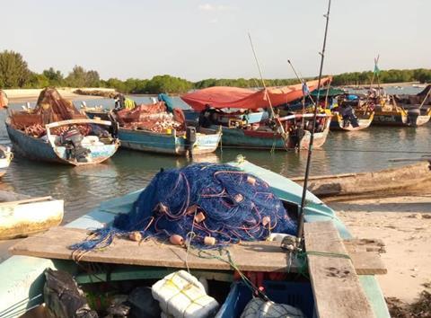 Artisanal fishing boats loaded with traditional gear
