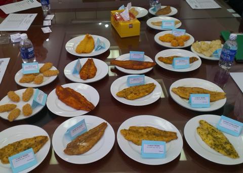 Marinated and breaded pangasius at a pangasius tasting at the Godaco Pangasius Processing Factory in Vietnam