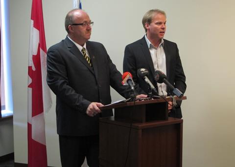 Vaughn Granter, Minister of Fisheries and Aquaculture, is joined by Robin Quinlan, Vice President of Quinlan Brothers Limited for the announcement of $100,000 to support enhancements at the Quinlan Brothers plant