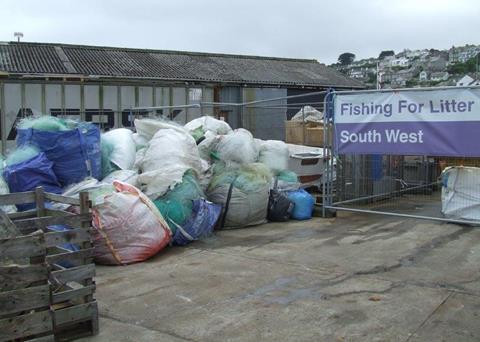 Fishing for Litter at Newlyn Harbour, UK
