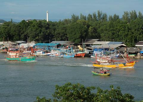 The fleet leaving harbour at sunset