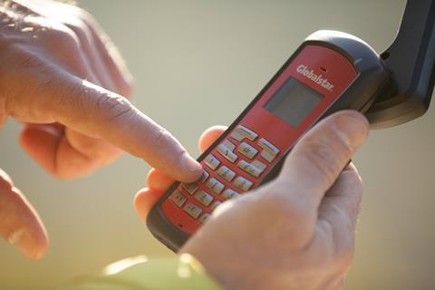 Hand dialling on a satellite phone