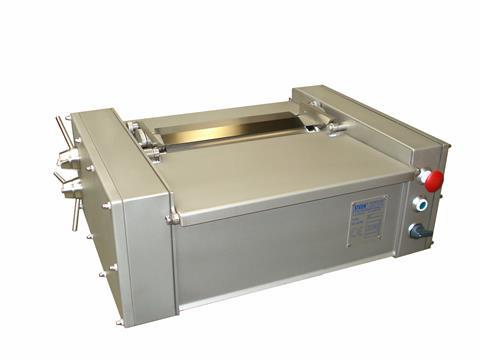 The ST700/T table top skinning machine