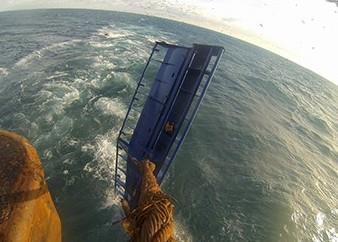 Cornelis Vrolijk was the first vessel to use the new Flipper doors. Here the door is seen in action with the foils released. Credit: Cornelis Vrolijk